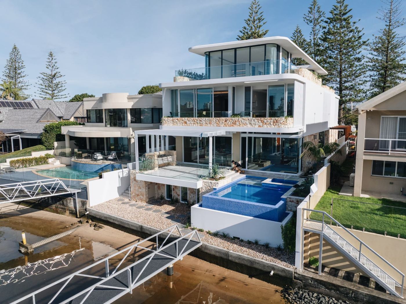 Waterfront residence on the Gold Coast with pool and stone facade